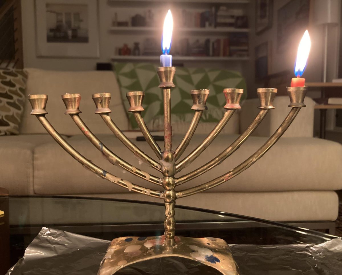 A chanukiah, candles burnt down, on the first night of Chanukah.