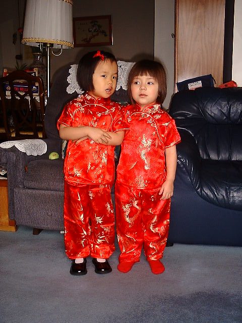 Ms. Toy at age 3, on the right, with her cousin.